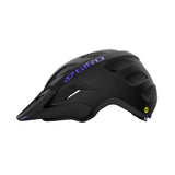 Giro Verce MIPS Women's Mountain Bike Helmet in a trail setting Matte Black Electric Purple Left