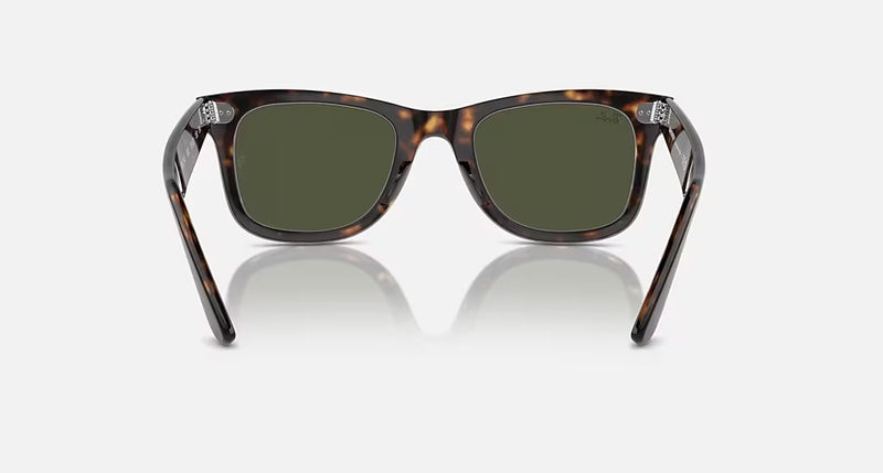 Ray-Ban Wayfarer Classic sunglasses in various colors with polarized and gradient lenses, featuring acetate frames and iconic logo.