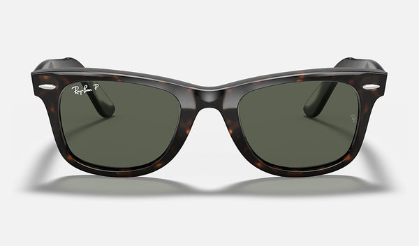 Ray-Ban Wayfarer Classic sunglasses in various colors with polarized and gradient lenses, featuring acetate frames and iconic logo.