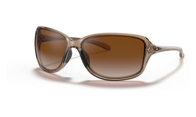 Oakley Cohort Women Sunglasses with a generously sized rectangular shape, thinly curved frame, and full coverage wrap, designed for all-day comfort and performance.